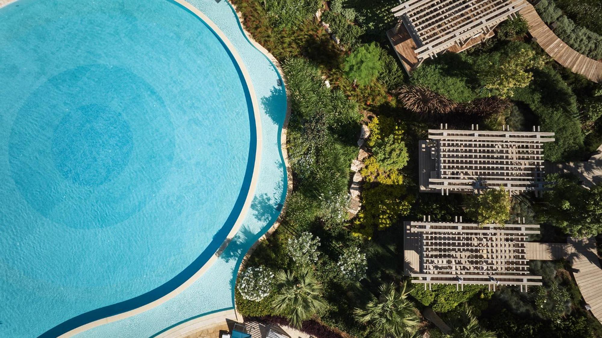 City Of Dreams Mediterranean - Integrated Resort, Casino & Entertainment Limassol Exteriör bild Aerial view of the pool